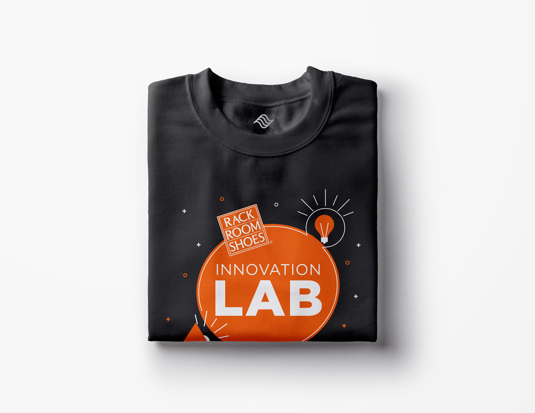 black t-shirt with the innovation lab logo on it posted on a white background